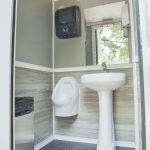 Climate Controlled Comforts of Home 2-Stall Restroom Trailer with urinal and sink